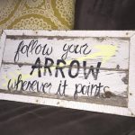 follow your arrow sign
