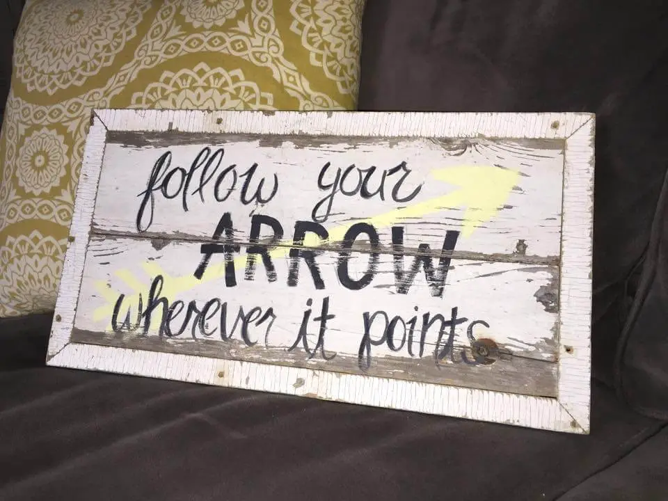 follow your arrow sign