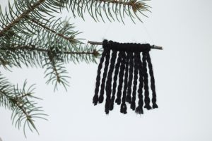 Create simple and modern DIY Christmas ornaments with yarn and twigs! | My Breezy Room