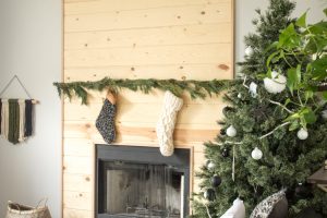 Love this modern Christmas home tour! It's a simple way to mix natural elements with black and white and teal for a classic, modern holiday look!