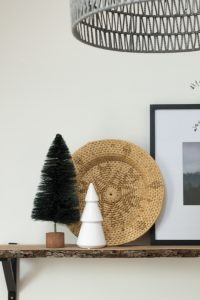 Love this modern Christmas home tour! It's a simple way to mix natural elements with black and white and teal for a classic, modern holiday look!