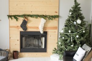 Love this modern Christmas home tour! It's a simple way to mix natural elements with black and white and teal for a classic, modern holiday look!