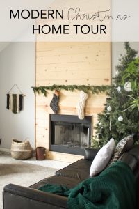 Love this modern Christmas home tour! It's a simple way to mix natural elements with black and white and teal for a classic, modern holiday look!