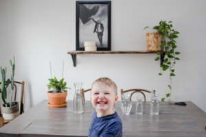 Simple shelf decorating idea: Propagated pothos in various sized jars/vases